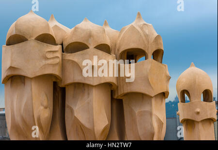 Barcelona, Guadi's The Pedrera (Casa Mila) on the roof with its unusual chimneys, Catalonia, Spain