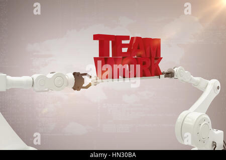 White robotic hand holding team work text against white background against vignette Stock Photo