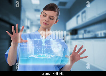 Beautiful female doctor using invisible digital screen against medical interface in blue and black 3d Stock Photo