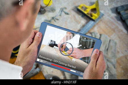 Fast forward sign on digitally generated blank screen against man using digital tablet and smart phone at table Stock Photo