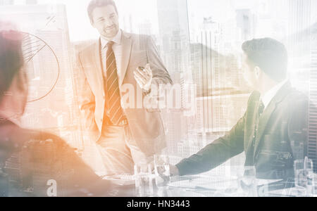 Businessman presenting new project to partners Stock Photo