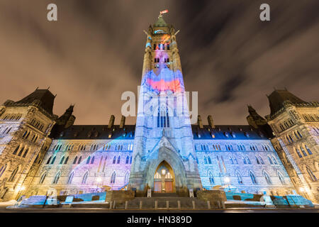Winter holiday light show projected at night on the Canadian House of Parliament to celebrate the 150th Anniversary of Confederation of Canada in Otta Stock Photo