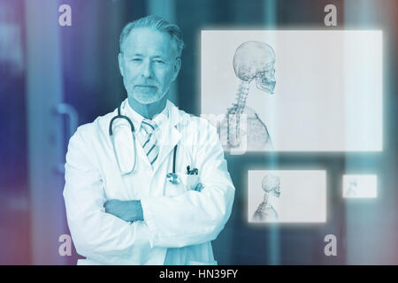 Transparent skeleton graphic in black against portrait of male surgeon standing with arms crossed 3d Stock Photo