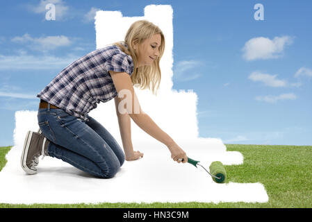 Woman painting renaturating living ambience Stock Photo