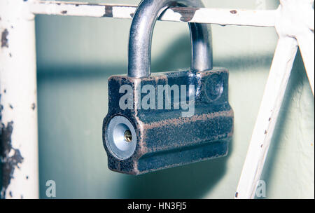 The lock on the door of the lattice Stock Photo