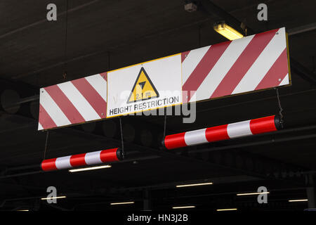 Height Restriction Sign in Underground Car Park Stock Photo