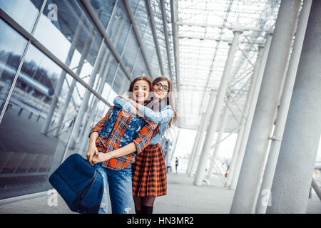 Girls having fun and happy when they met at the airport.Art proc Stock Photo