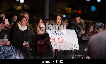 Hamburg, Germany. 7th Feb, 2017. Fans cheer at the European premiere of the film 'Fifty Shades Darker' at the CinemaxX Dammtor in Hamburg, Germany, 7 February 2017. The movie will start in cinemas on the 9 February. Photo: Daniel Reinhardt/dpa/Alamy Live News Stock Photo