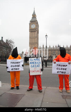 London, UK. 8th Feb, 2017. A group of protesters stand opposite Parliament to campaign for the closure of Guantanamo US detention camp in Cuba and the proposed use of torture by President Donald Trump Credit: amer ghazzal/Alamy Live News Stock Photo