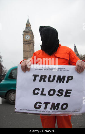 London, UK. 8th Feb, 2017. A group of protesters stand opposite Parliament to campaign for the closure of Guantanamo US detention camp in Cuba and the proposed use of torture by President Donald Trump Credit: amer ghazzal/Alamy Live News Stock Photo