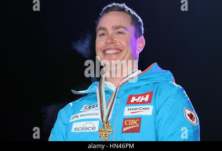 St. Moritz, Germany. 08th Feb, 2017. Erik Guay of Canada showing his gold medal at the victory ceremony for the Super G men's eventz at the Alpine Skiing World Cup in St. Moritz, Germany, 08 February 2017. Photo: Michael Kappeler/dpa/Alamy Live News Stock Photo