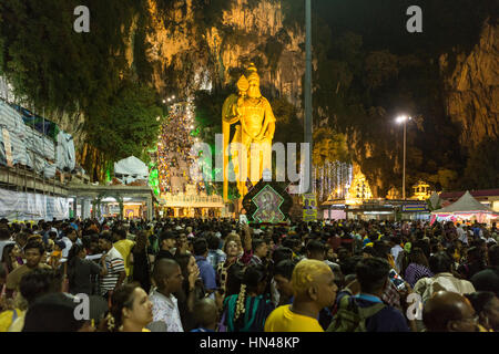 Kuala Lumpur, Malaysia. 08th Feb, 2017. Hindu devotees make their way toward the Batu Caves temple to make offerings during the Thaipusam Festival on the outskirts of Kuala Lumpur, Wednesday, 8 February 2017. Thaipusam is a Hindu festival observed by the Tamil speaking community in Malaysia commemorating the birthday of the Hindu deity Murugan. The Lord Murugan is venerated as a granter of favours - if a wish is granted, supplicants repay the Lord through sacrifices. Credit: Asia File/Alamy Live News Stock Photo