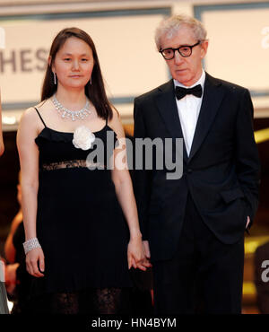 Director Woody Allen and wife Soon-Yi Previn arrive at the premiere for the film 'Vicky Cristina Barcelona' at the Palais des Festivals during the 61st International Cannes Film Festival on May 17 , 2008 in Cannes, France.. Photo by Francis Specker Stock Photo