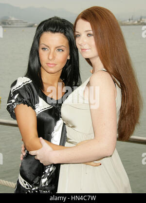 Julia Volkova (L) and Lena Katina of Russian pop group t.A.T.u attend the 'You and I' photocall at the Carlton beach pier during the 61st Cannes International Film Festival on May 16, 2008 in Cannes, France. Photo by Francis Specker Stock Photo