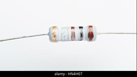 one round small resistor on electrical circuit background Stock Photo ...
