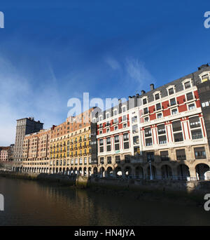 Skyline of Bilbao, the largest municipality of the Autonomous Community of the Basque Country, with view of the Nervion River, palaces and buildings Stock Photo