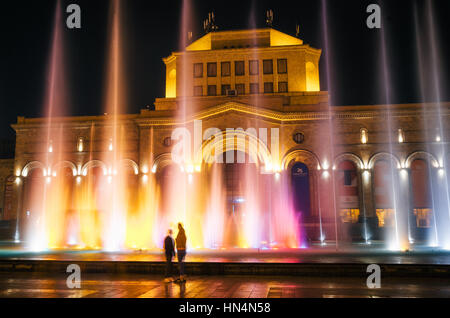 Yerevan, Armenia. September 10, 2016: The colored singing musical dancing fountains against the building of the National Gallery and History Museum of Stock Photo