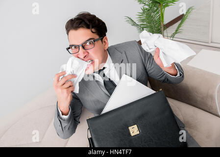 Angry businessman with crumbled paper Stock Photo