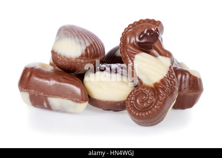 Belgian bonbons shaped as seashells isolated on white background Stock Photo