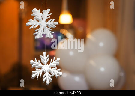 decor snowflakes foam plastic. Christmas winter decoration for home, garden, apartment. Stock Photo