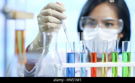 Female scientist researching in laboratory Stock Photo