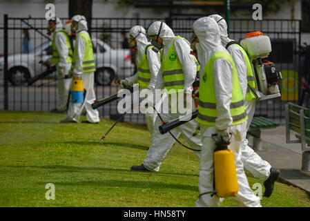 Buenos Aires, Argentina - March 3, 2016: Employees of the Ministry of Environment and Public Space fumigate for Aedes aegypti mosquitos. Stock Photo