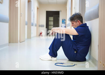 There is too much pressure working as a doctor Stock Photo