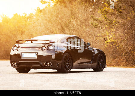 SISTIANA, ITALY JUNE 12, 2013: Photo of a Nissan GT-R Black Edition. The Nissan GT-R is a 2-door 2+2 sports car produced by Nissan and unveiled in 200