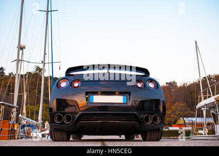 SISTIANA, ITALY JUNE 12, 2013: Photo of a Nissan GT-R Black Edition. The Nissan GT-R is a 2-door 2+2 sports car produced by Nissan and unveiled in 200