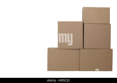 Stack of cardboard boxes against white background Stock Photo