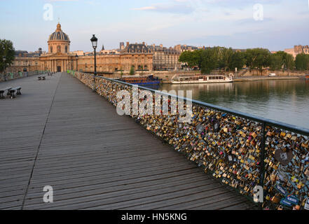 The hundreds of thousands of love inscribed padlocks on the Pont Des Arts Bridge, Paris France. Stock Photo