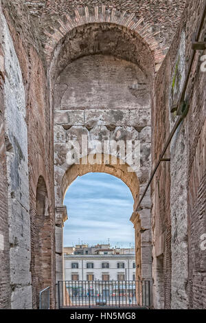 A view of the impressive ancient roman colosseum situated in the Italien capital of Rome. Stock Photo