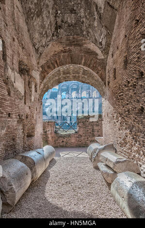 A view of the impressive ancient roman colosseum situated in the Italien capital of Rome. Stock Photo