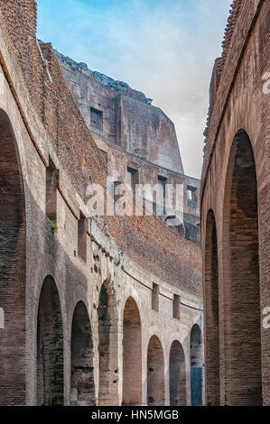 A view of the impressive ancient roman colosseum situated in the Italien capital of Rome. Stock Photo