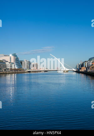 DUBLIN, IRELAND - 14 APRIL 2015: Samuel Beckett Bridge crossing the River Liffey in Dublin, Ireland Stock Photo
