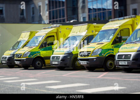 liveried ambulances parked on duty in designated bays at Manchester Royal Infirmary  accident and emergency department Stock Photo