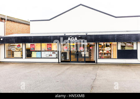 Aga cooker shop selling aga cookers store supplying aga cookers suppliers to homes UK England Stock Photo
