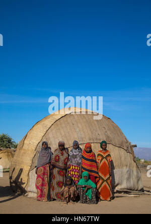 Portrait of Afar tribe women in front of their traditional hut, Afar region, Afambo, Ethiopia Stock Photo