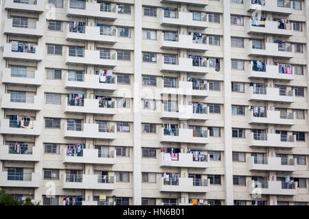 TOKYO- MAY 25: A basic, residential tower block in the Tsukiji district of Tokyo on 25th May 2012. The rows of windows and balconies face out onto the