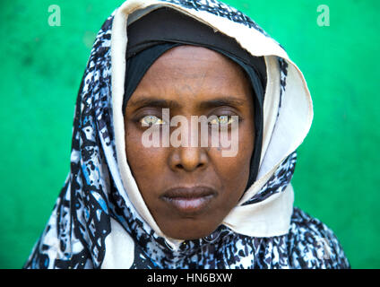 Portrait of an Afar tribe woman with green eyes and tattoos on her face, Afar region, Assaita, Ethiopia Stock Photo