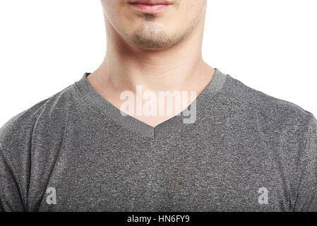 close up of gray v neck t-shirt on mans isolated on white Stock Photo