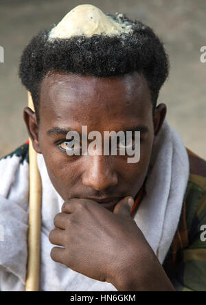 Portrait of a Raya tribe man with butter on his head to show he is on honeymoon, Amhara region, Gobiye, Ethiopia Stock Photo