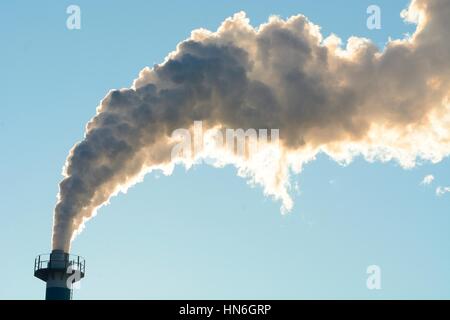 Smoke from an industial chimney, Ystad, Sweden Stock Photo