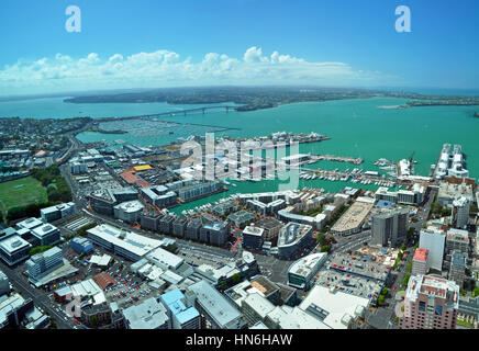 Panoramic aerial view of Auckland City &  Waitemata Harbour looking northwest to the  iconic Auckland Harbour Bridge in the distance. Stock Photo