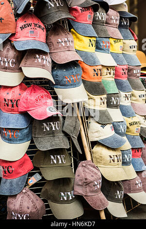 New York hat stand with NYC baseball caps on display Stock Photo