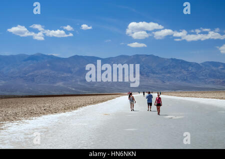 Stovepipe Wells, USA - May 8, 2014: Badwater basin in Death Valley National Park, California, USA with people walking on salt flats Stock Photo