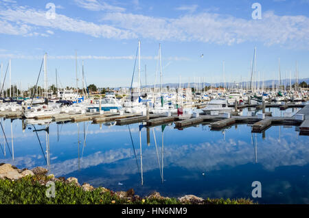 Boats dock and marina with reflection at harbor in Oxnard, California Stock Photo