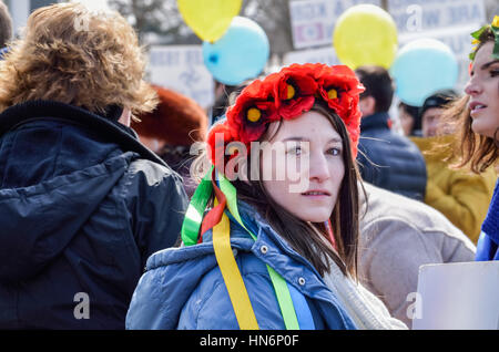 Washington DC, USA - March 6, 2014: Ukrainian woman wearing a flower wreath on head with ribbons at protest Stock Photo