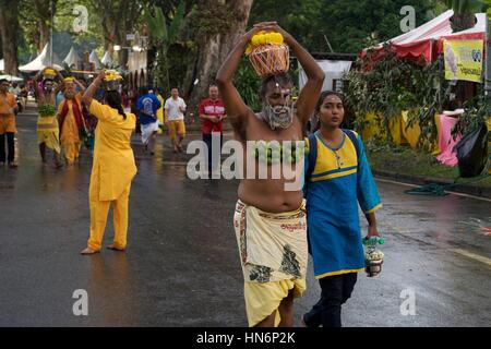 Thaipusam celebration in Penang. Devotees performing kavadi attam towards Lord Murugan, God of War in Hinduism. Stock Photo