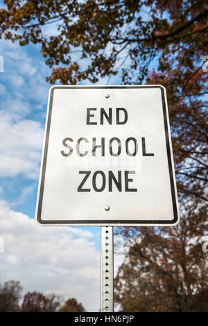 Public End School Zone sign on road Stock Photo